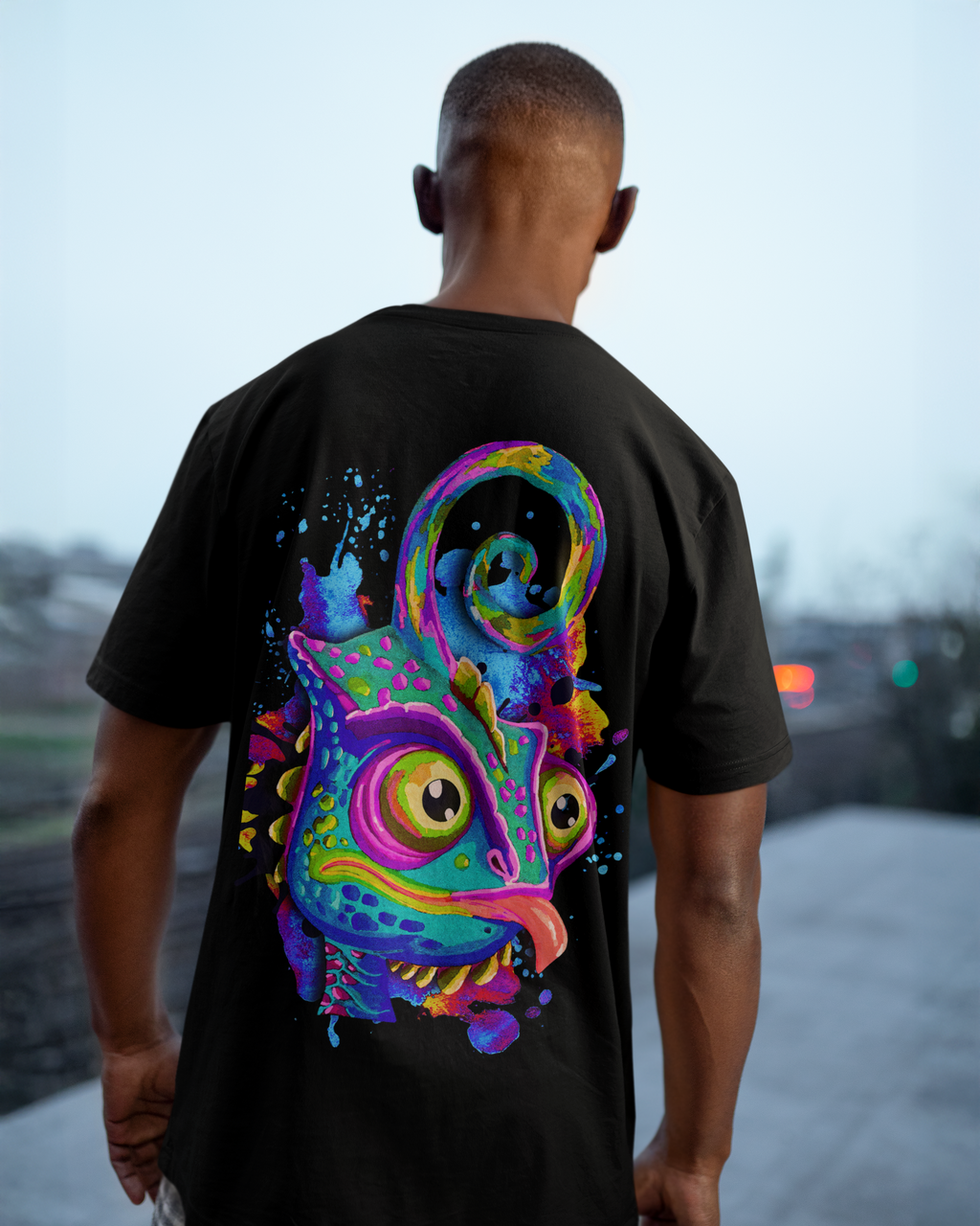 Back view of man wearing black Gobsmack lmno t-shirt